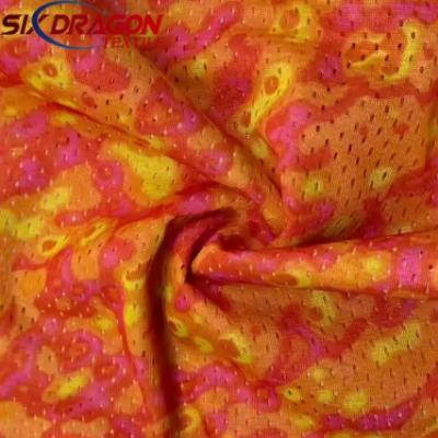 2025 New fashion printed customized orange camo cotton fabric for garment