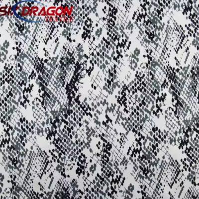 Customized 97% cotton 3% spandex snake print cotton fabric for girls' dress suits